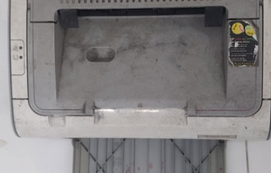 Sửa chữa máy in cho cty Muto Việt Nam